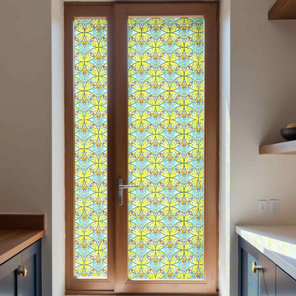 ADD.HERES Floral Sequence 3D Stained Glass Window Film: Vibrant yellow & blue boho privacy window film for kitchen doors.